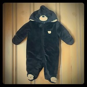 Dark brown baby bear snow suit.